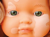 Poppen - babypop - Miniland - Europees meisje met vitiligo - huidvlekken - Special Needs - 38 cm - per stuk